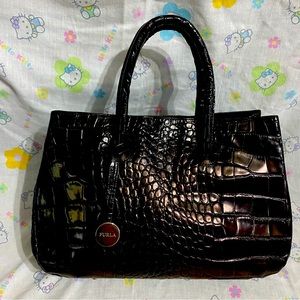 Vintage Furla embossed leather handbag.